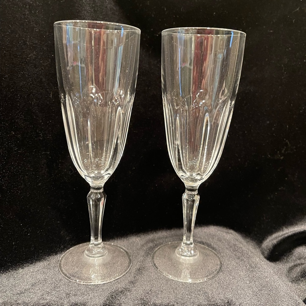 Set of two crystal champagne flutes by Cristal D'Arques-Durand.